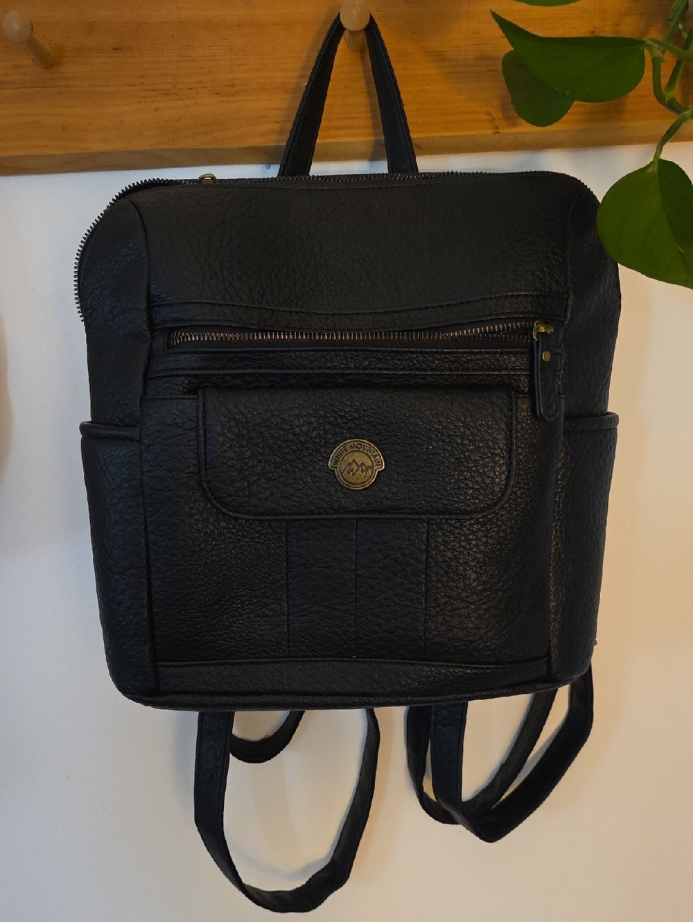White Mountain Black Pebbled Leather Backpack with Gold Logo Medallion
